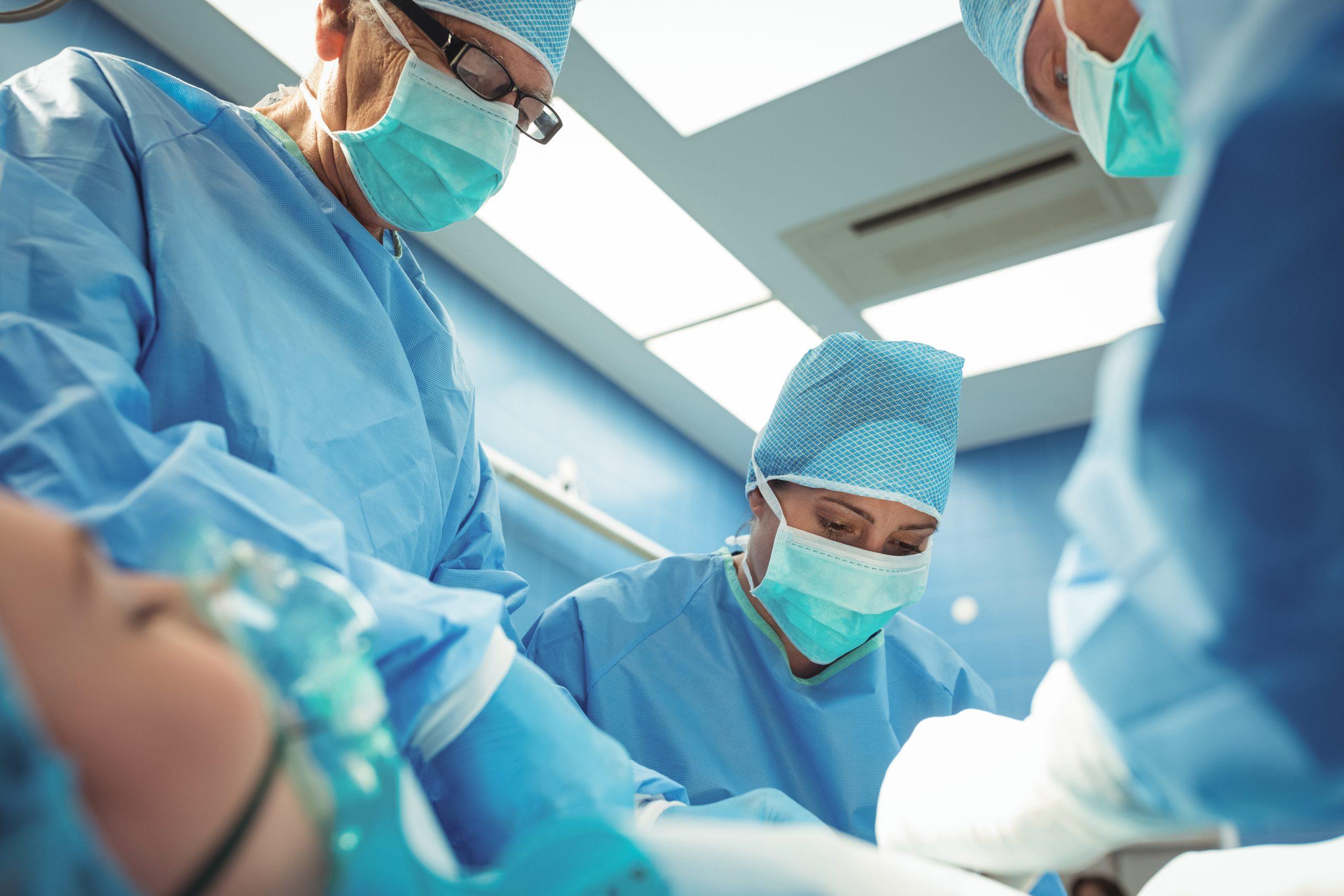 Team of surgeons operating